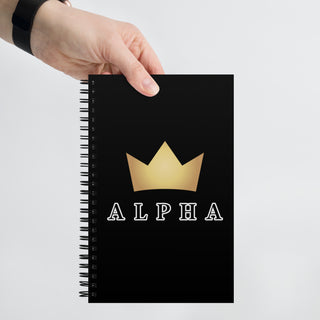 A man holding the Already Regis® ALPHA Spiral Notebook