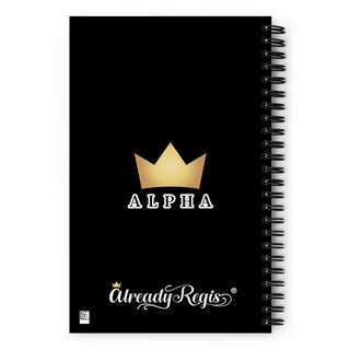 Back of a black spiral notebook with a gold crown over the word, ALPHA, and the logo for Already Regis®