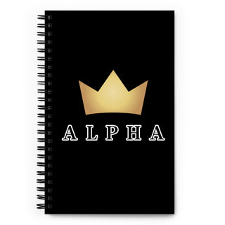 Black Spiral notebook with a gold crown over the word, ALPHA